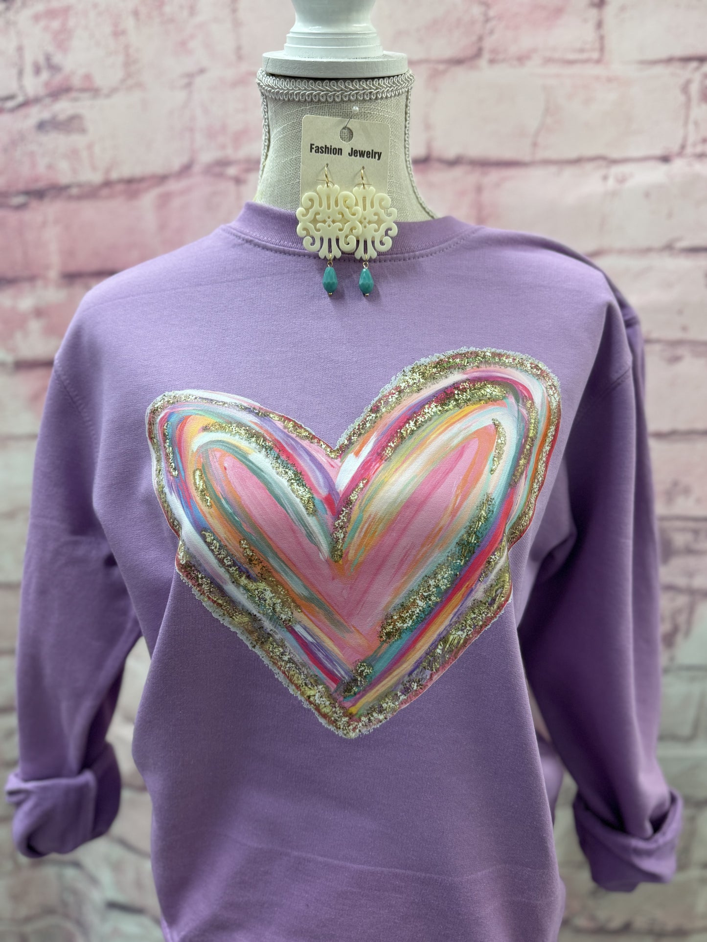 Watercolor heart on purple sweatshirt