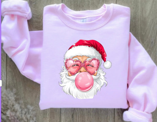 Santa Claus blowing a bubble pink sweatshirt